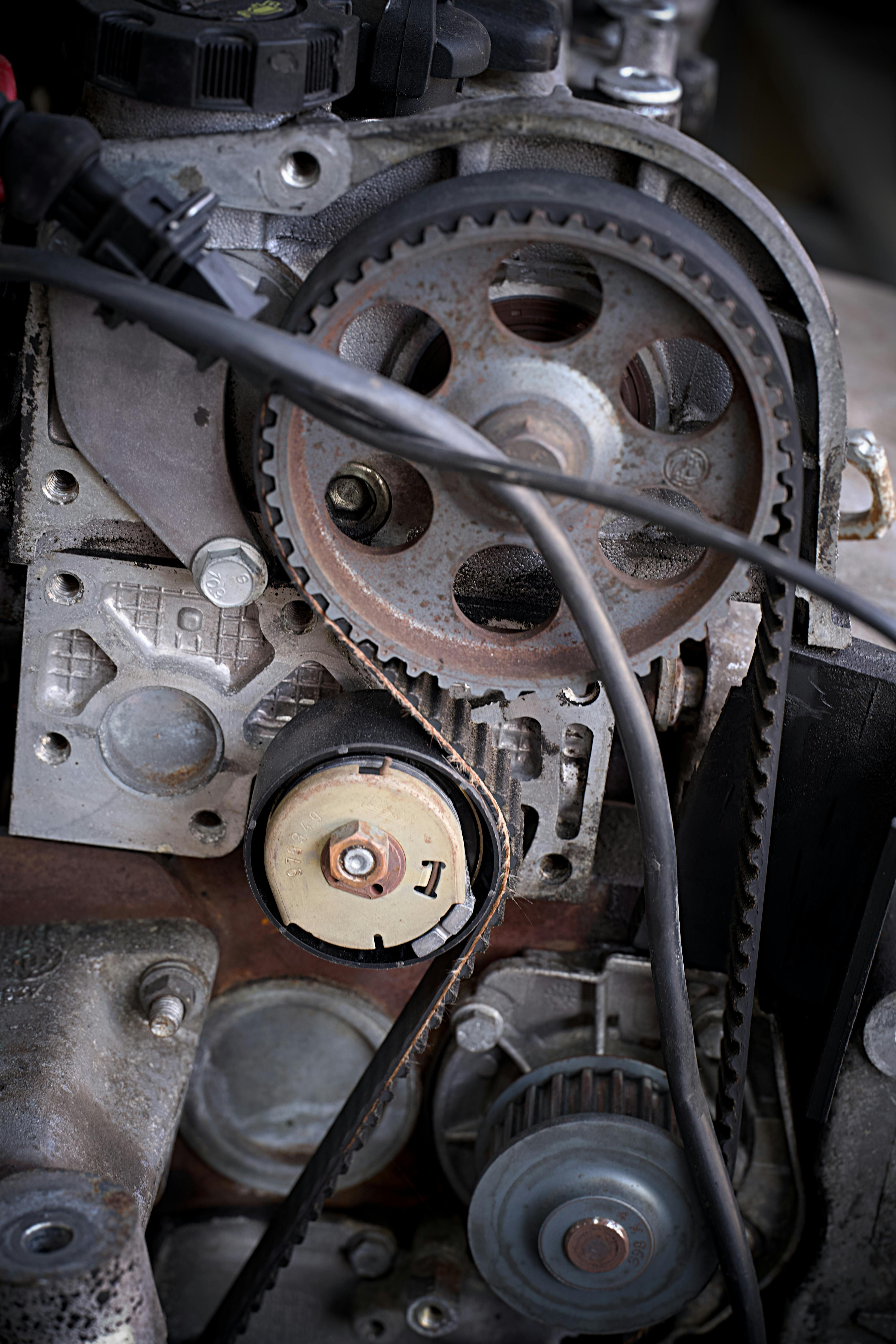 Happy customer receiving car keys from mechanic after service completion